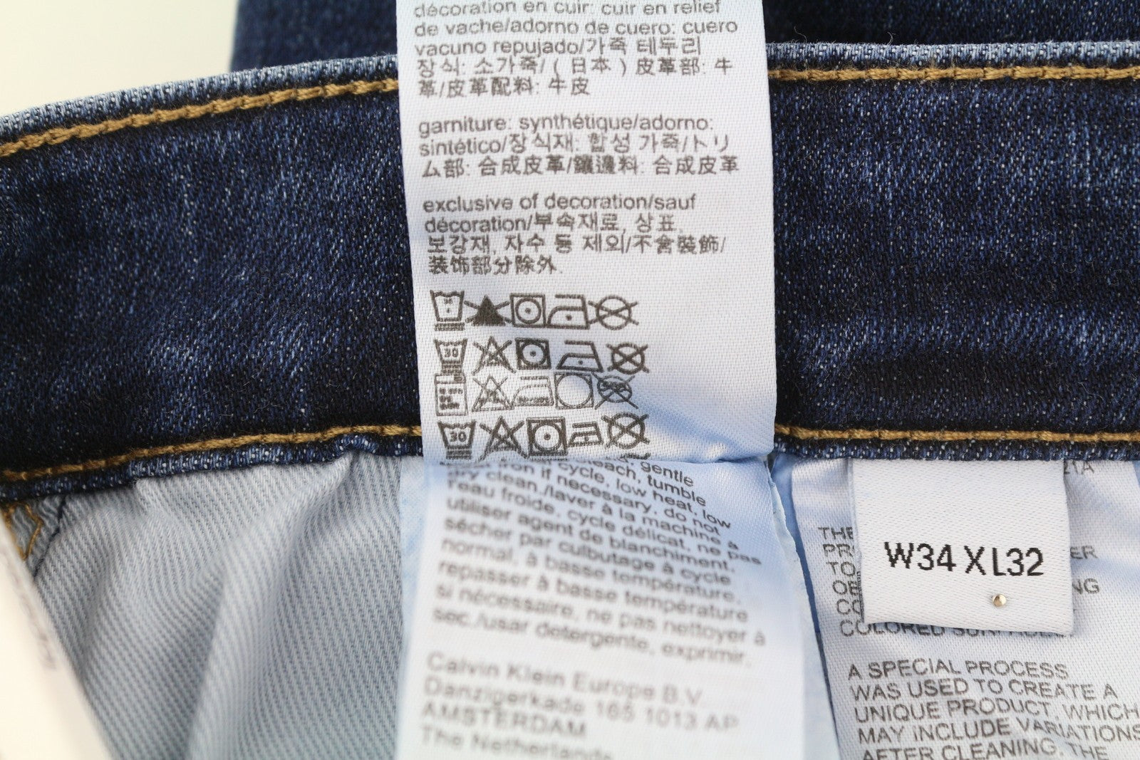 CALVIN KLEIN Men Jeans W34/L32 Dark Blue Tapered Fit Stretch Zip Fly Logo Denim