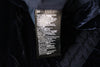 Blaue Polyesterjacke