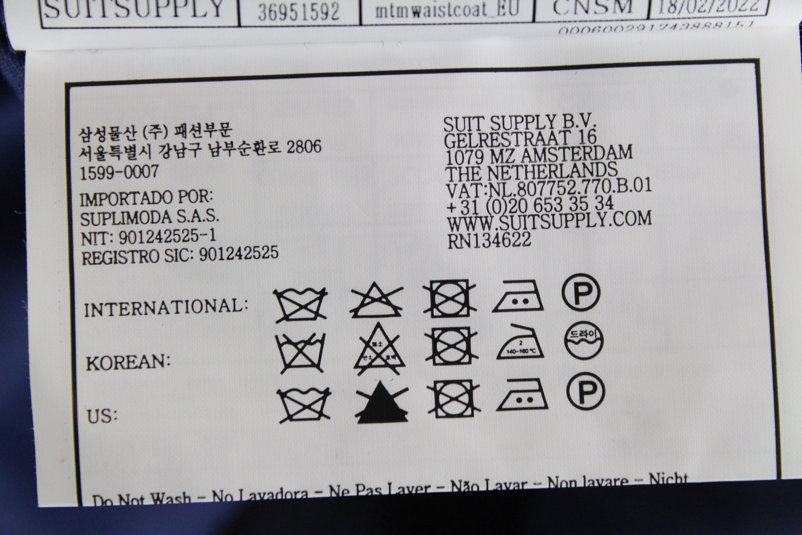 SUITSUPPLY Ferrara vyriška mėlyna vilnonė liemenė UK42S V formos iškirpte, taškuotais pamušalais 