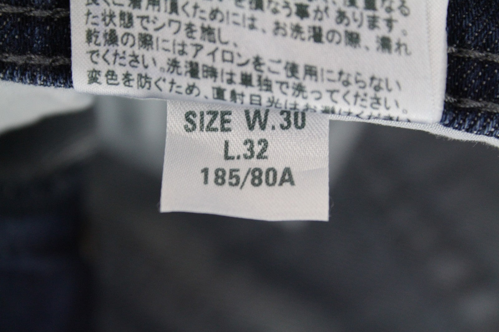 DIESEL Tepphar R39M0 vyriški džinsai W30/L32 mėlyni, ploni, morkų kirpimo, tamprūs, skalbti medvilniniai džinsai. 