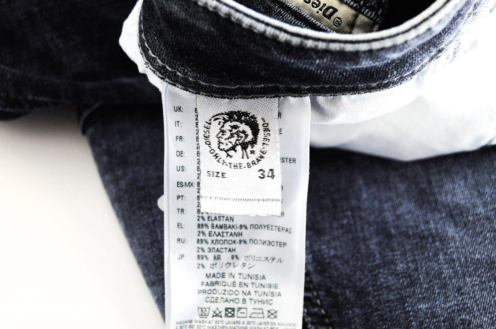 DIESEL Stickker 0687M vyriški aptempti itin ploni džinsai W34 L30 akmens mėlynumo 