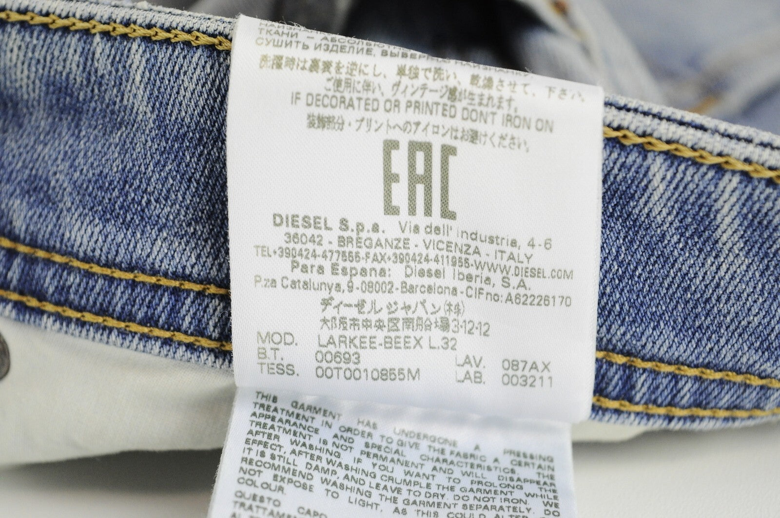 DIESEL Larkee-Beex 087AX vyriški džinsai W32/L32 siaurėjantys, dirbtinai nuskusti mėlyni 