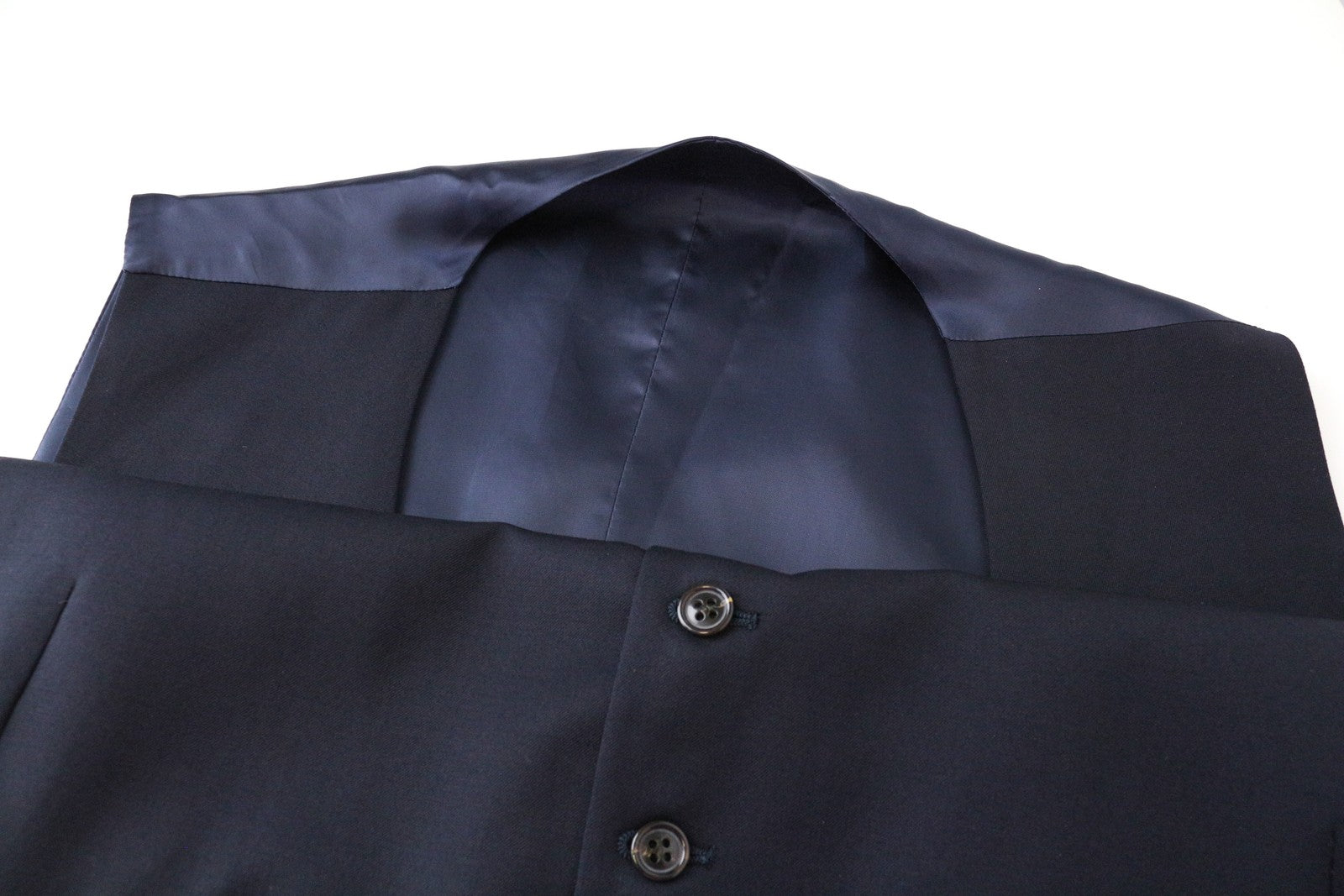 SUITSUPPLY vyriška liemenė UK52S su tamsiai mėlyna vilnoniu pamušalu ir V formos iškirpte 