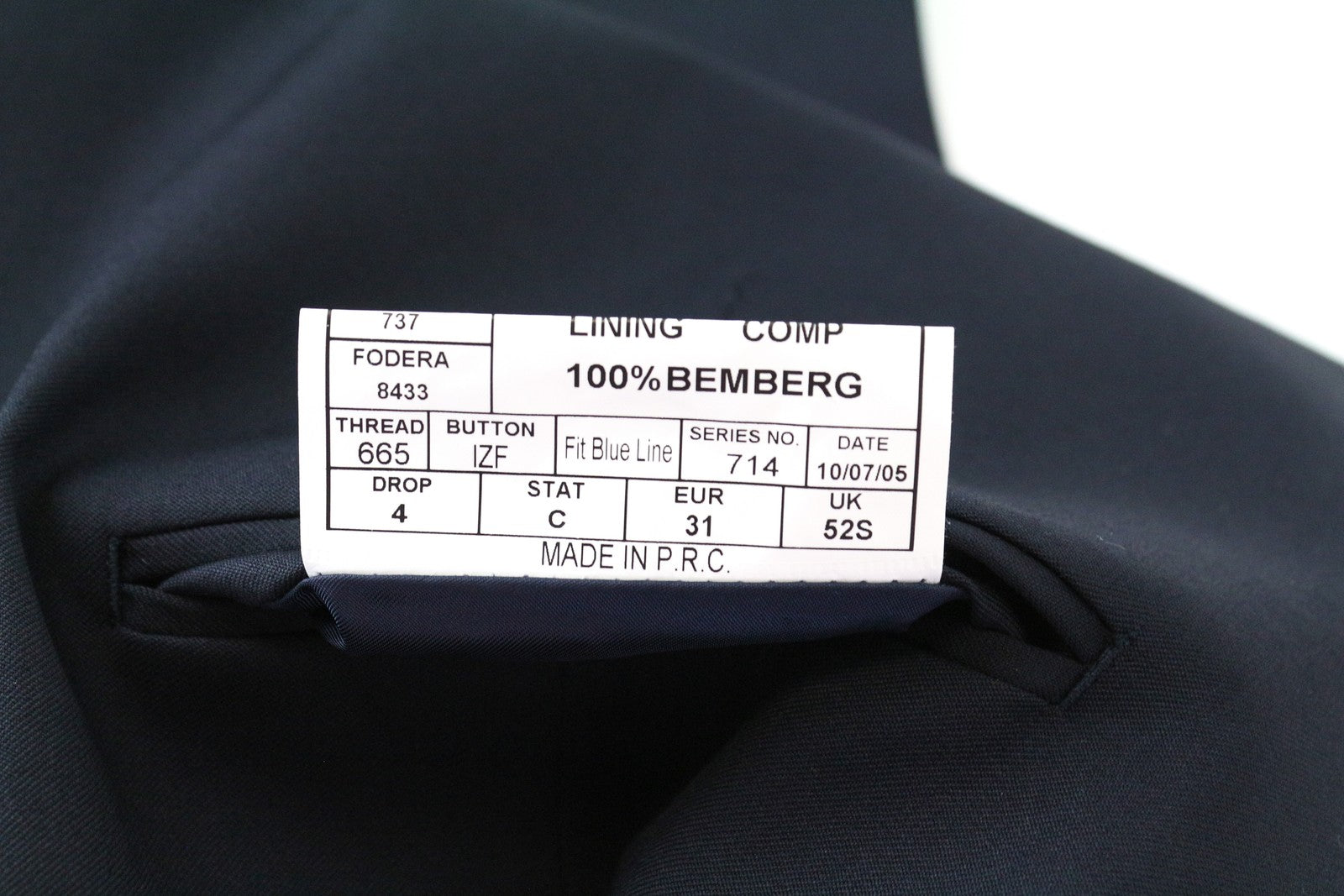 SUITSUPPLY vyriška liemenė UK52S su tamsiai mėlyna vilnoniu pamušalu ir V formos iškirpte 