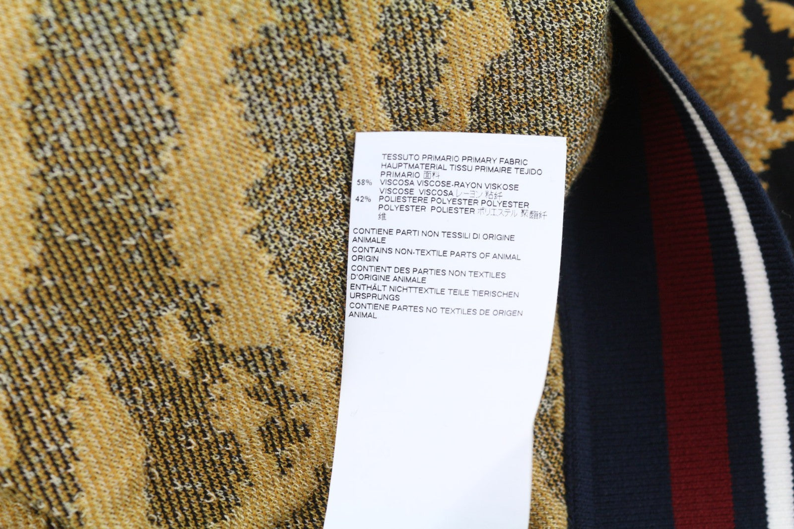 DSQUARED2 moteriška geltonai ruda S dydžio trumpa suknelė su gyvūnų raštu ir apykakle 