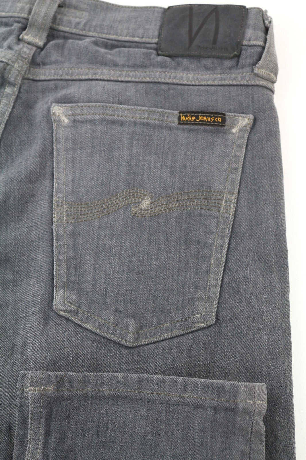 NUDIE JEANS vyriški aptempti ilgi John džinsai W31/L34 ploni tamsiai pilki, organinio audinio spalvos užtrauktukai 