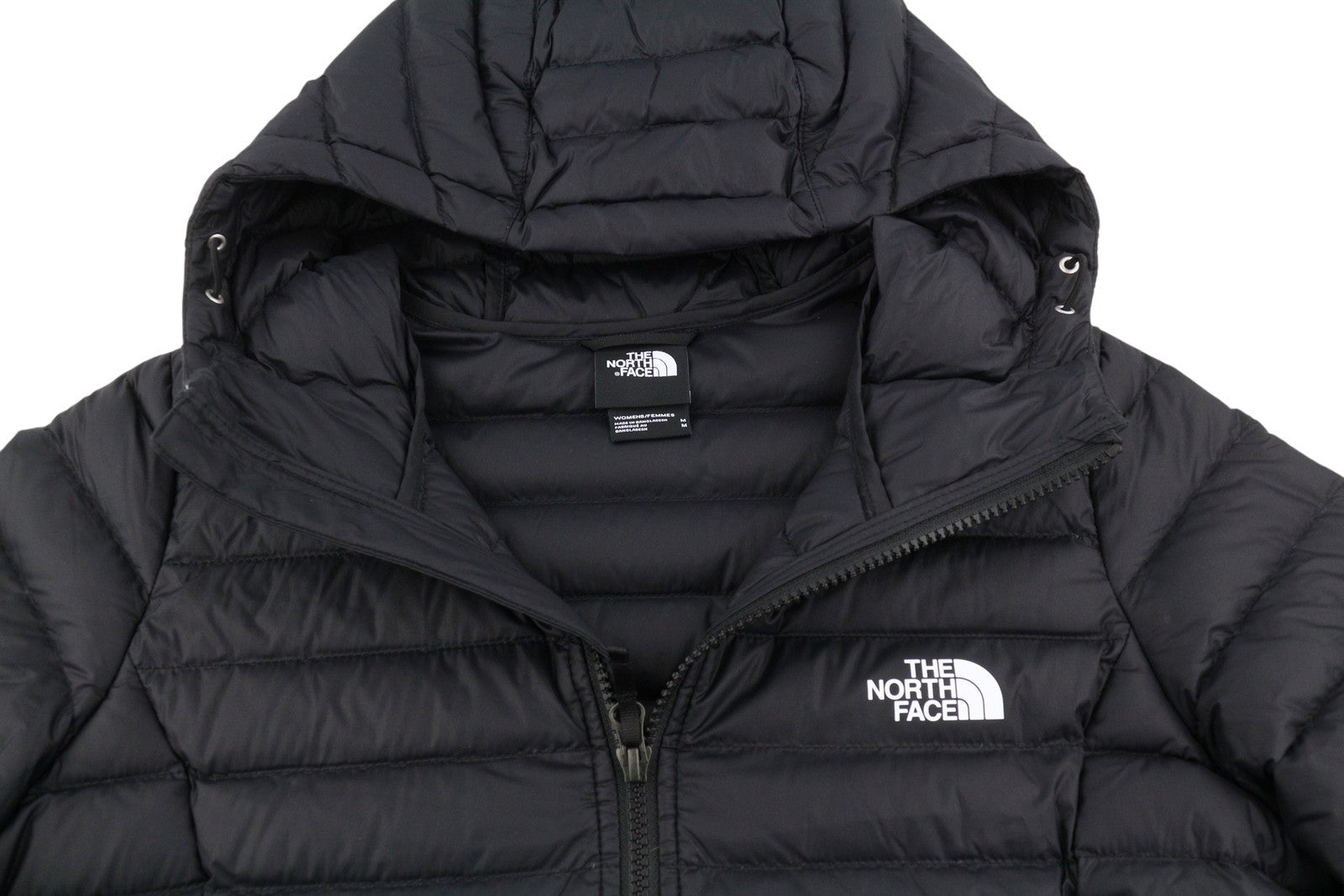 THE NORTH FACE moteriška striukė M, juoda, 700 pūkinė, dygsniuota, su gobtuvu, užtrauktuku, vidutinė kaina – 299 USD 