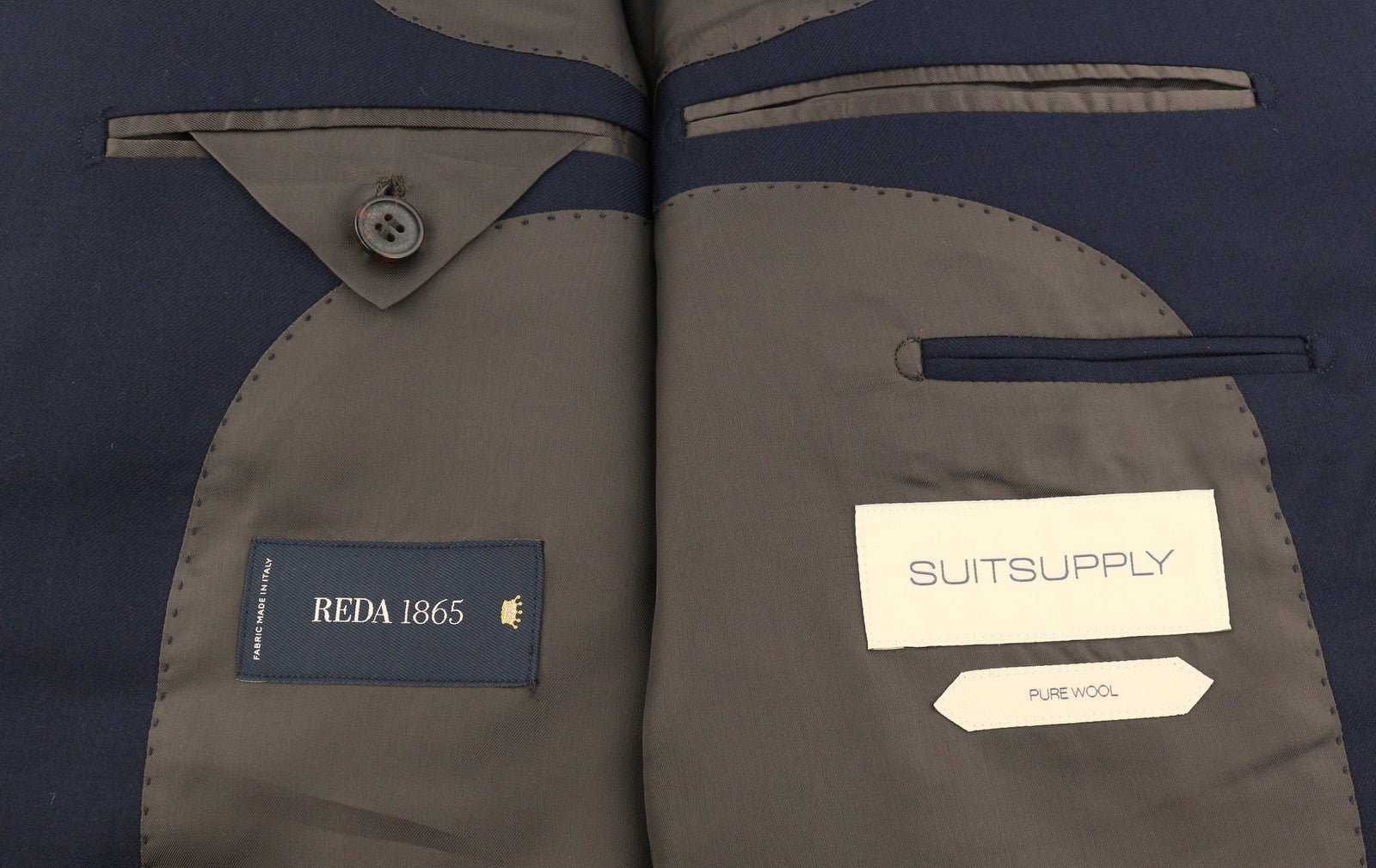 „SUITSUPPLY Napoli“ vienaeilis vyriškas švarkas, UK38R, mėlynas, grynos vilnos, su įpjova atvarte. 