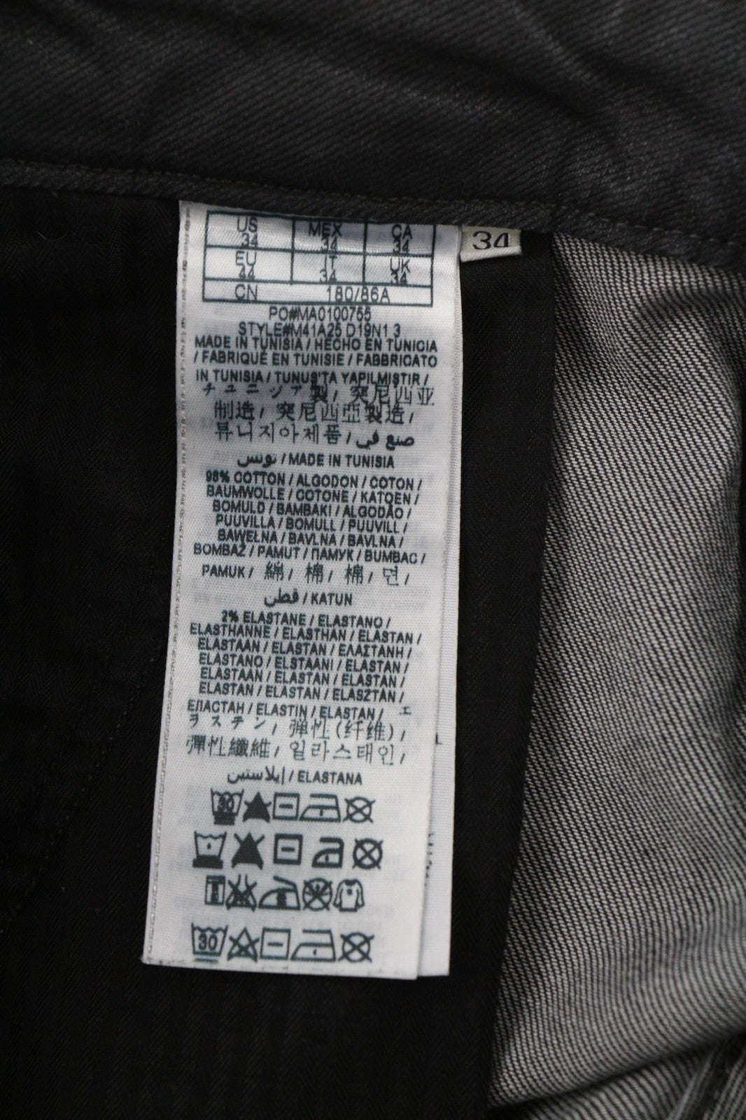 GUESS Tylor vyriški juodi tamprūs medvilniniai susukti ploni džinsai su sagomis 