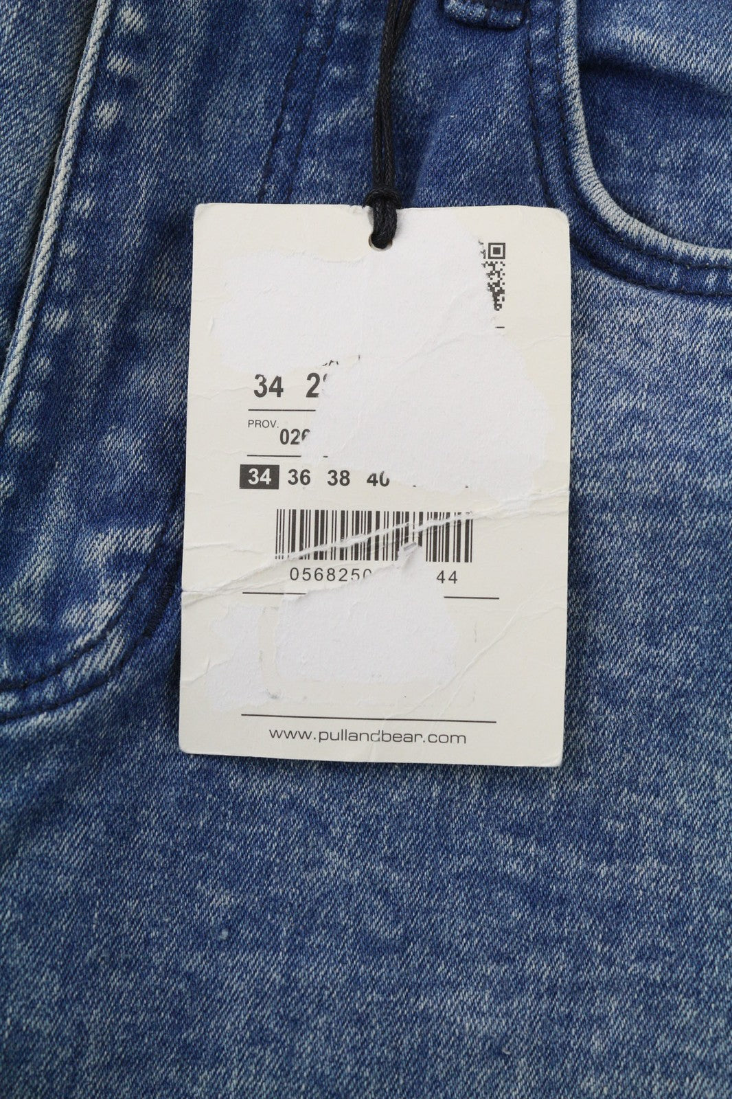 PULL &amp; BEAR vyriški mėlyni tamprūs, morkų kirpimo, laisvalaikio stiliaus džinsai su 5 kišenėmis, EU34 dydis 