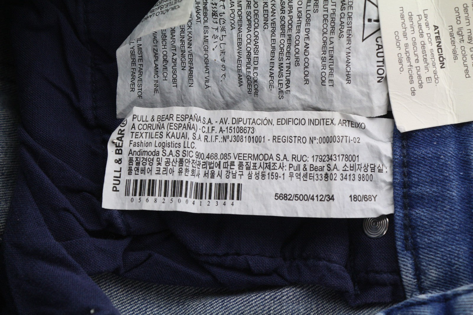 PULL &amp; BEAR vyriški mėlyni tamprūs, morkų kirpimo, laisvalaikio stiliaus džinsai su 5 kišenėmis, EU34 dydis 