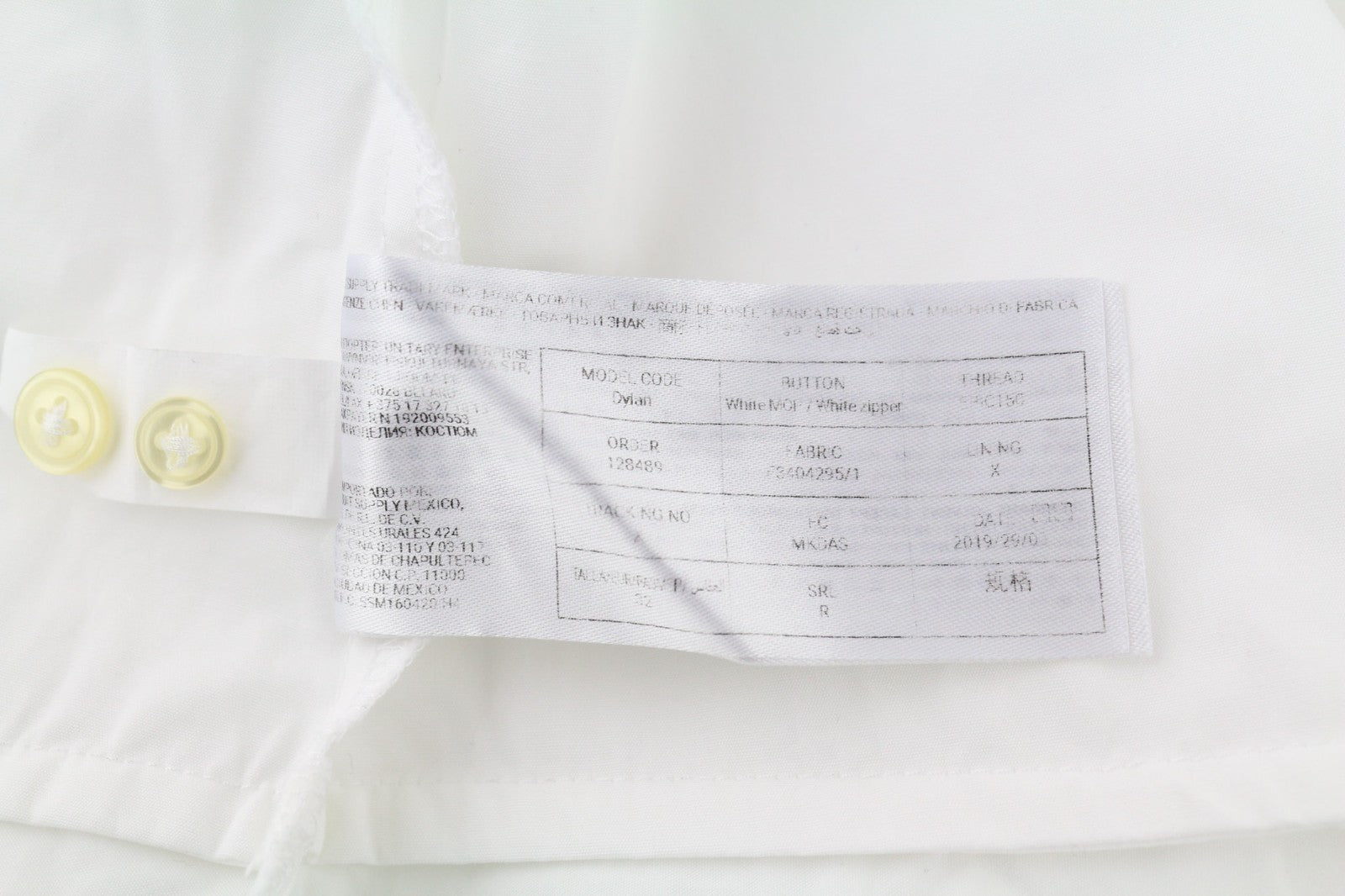 SUISTUDIO Dylan moteriška suknelė, UK6, balta, medvilninė, apvali apykaklė, ilgomis rankovėmis, trumpa, su logotipu. 