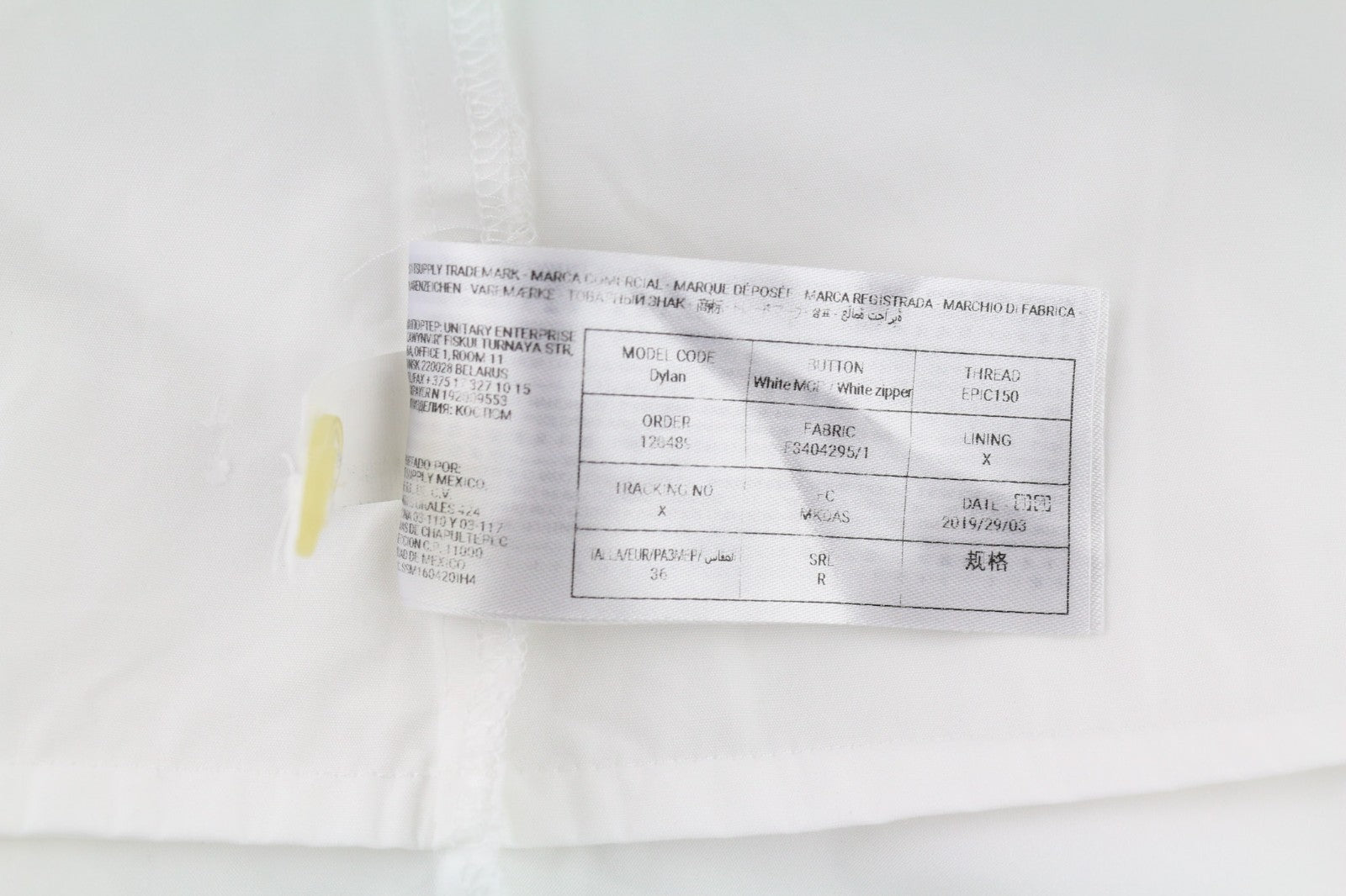 SUISTUDIO Dylan moteriška suknelė UK10 balta medvilninė ilgomis rankovėmis apvali apykakle trumpi logotipai 