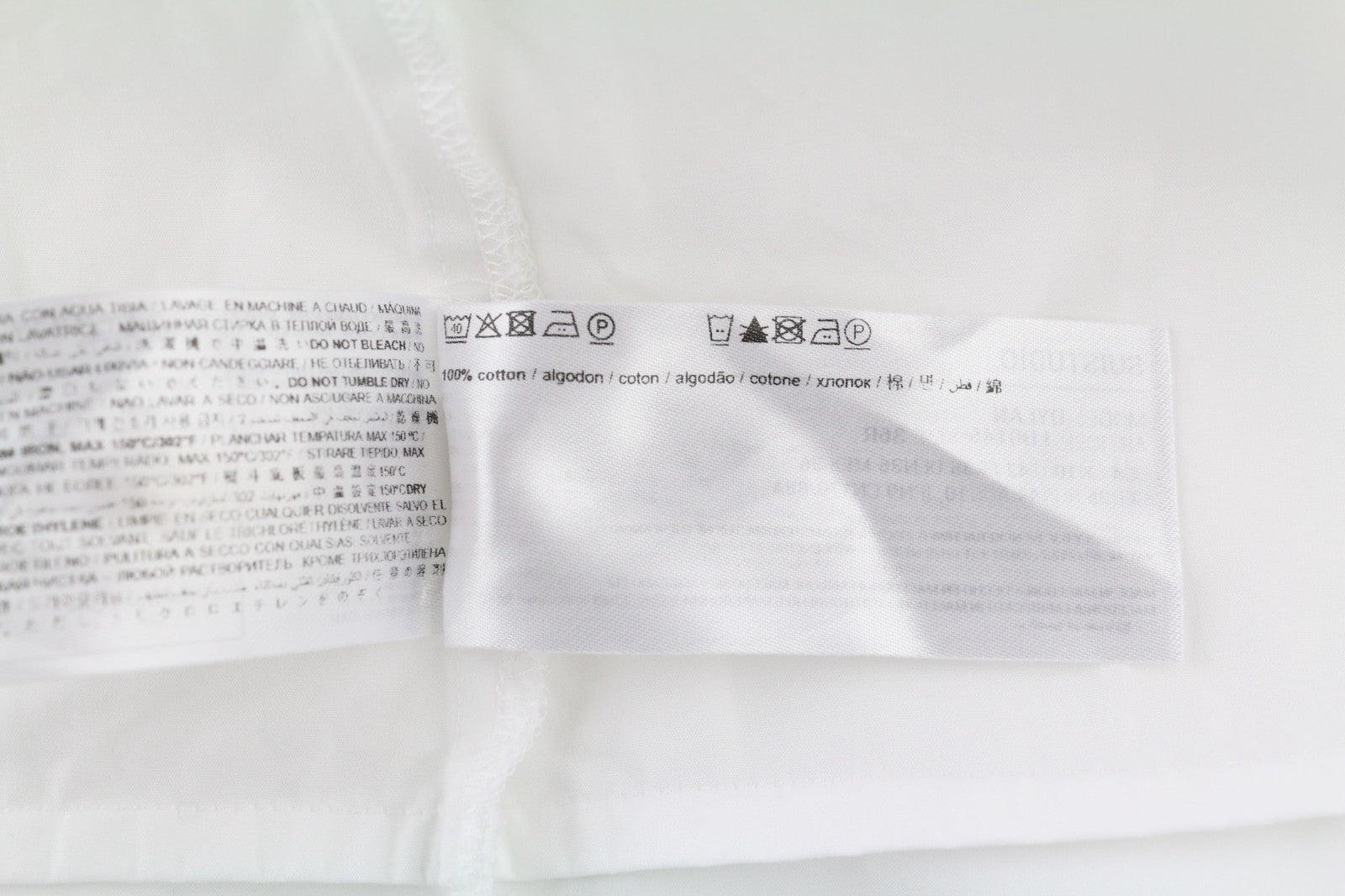 SUISTUDIO Dylan moteriška suknelė UK10 balta medvilninė ilgomis rankovėmis apvali apykakle trumpi logotipai 