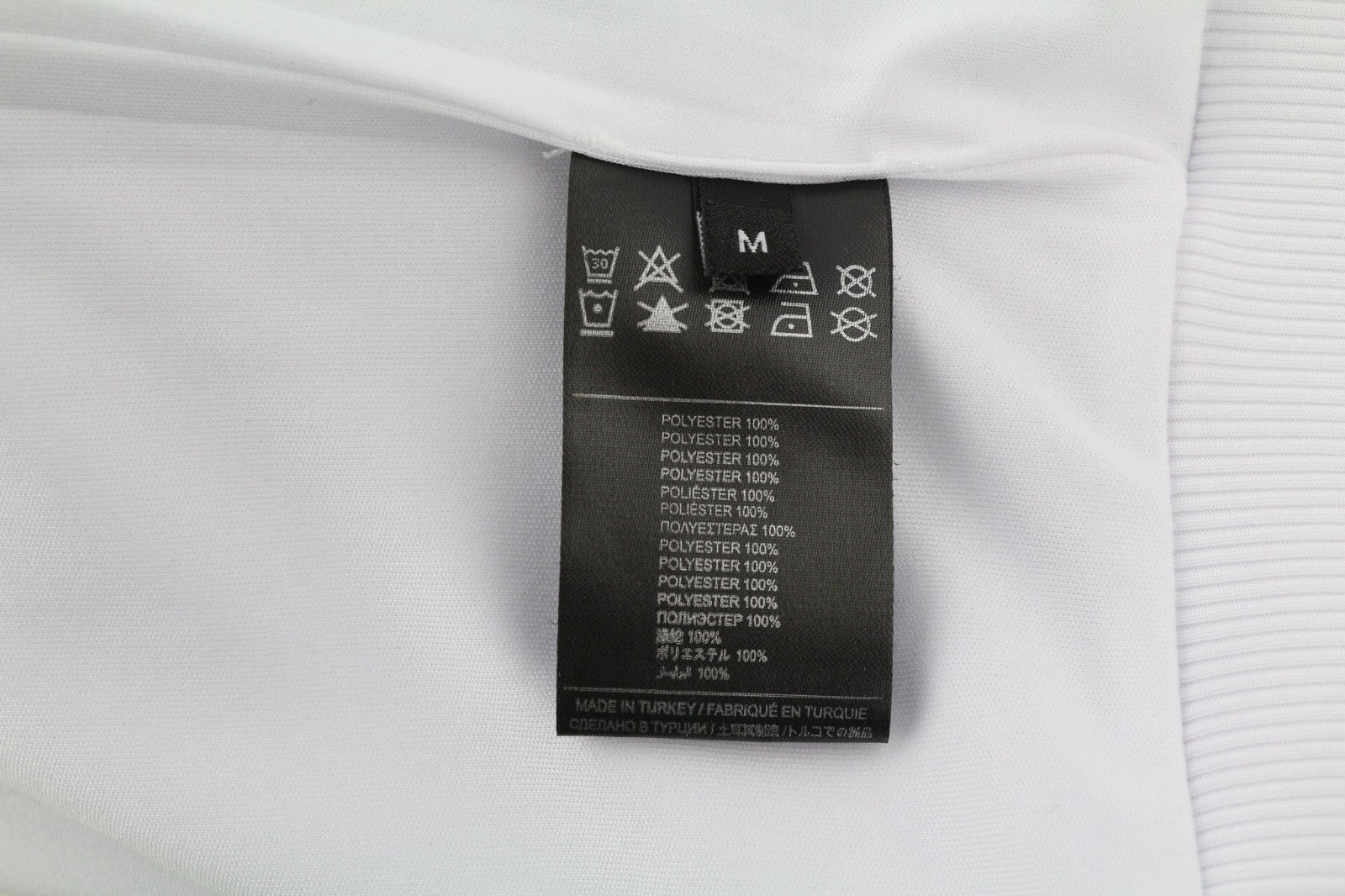 RICHMOND vyriškas sportinis kostiumas M, baltas, dviejų dalių, su užtraukiamais užtrauktukais, logotipu ir elastingu juosmeniu. 