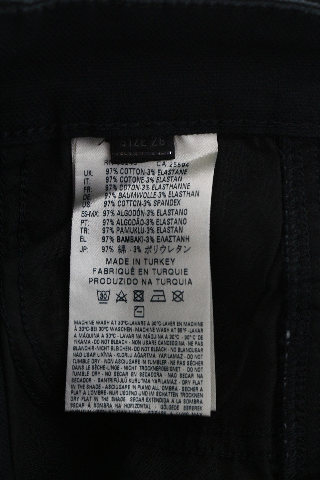 DIESEL P-Amal moteriškos kelnės W26 juodos, aptemptos, su užtrauktuku apačioje, kišenėmis, užtrauktuku ir logotipu. 