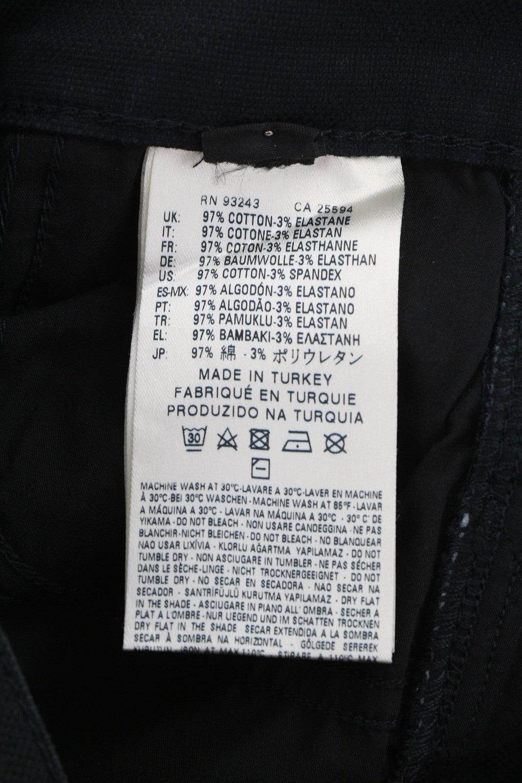 DIESEL P-Amal moteriškos kelnės W26 juodos, aptemptos, su užtrauktuku apačioje, kišenėmis, užtrauktuku ir logotipu. 