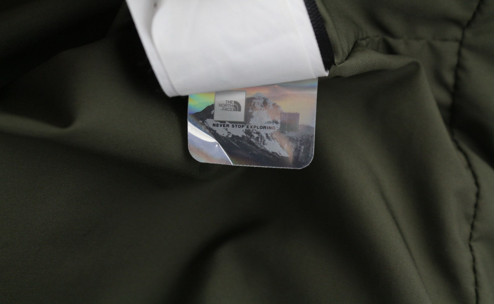 THE NORTH FACE Gotham moteriška striukė S Khaki 550 pūkinė su gobtuvu ir dygsniuota 