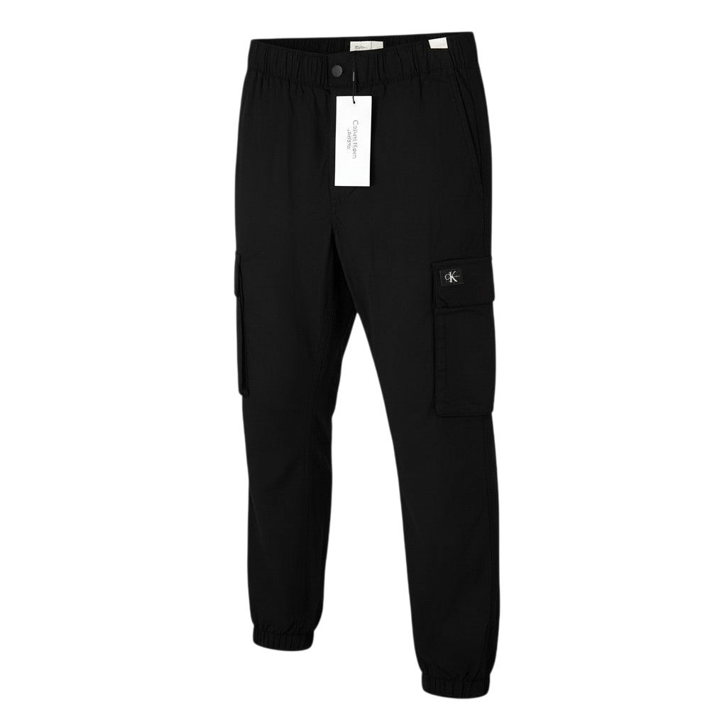 CALVIN KLEIN vyriškos kelnės W32 juodos, su elastingu juosmeniu ir languotomis kišenėmis. 