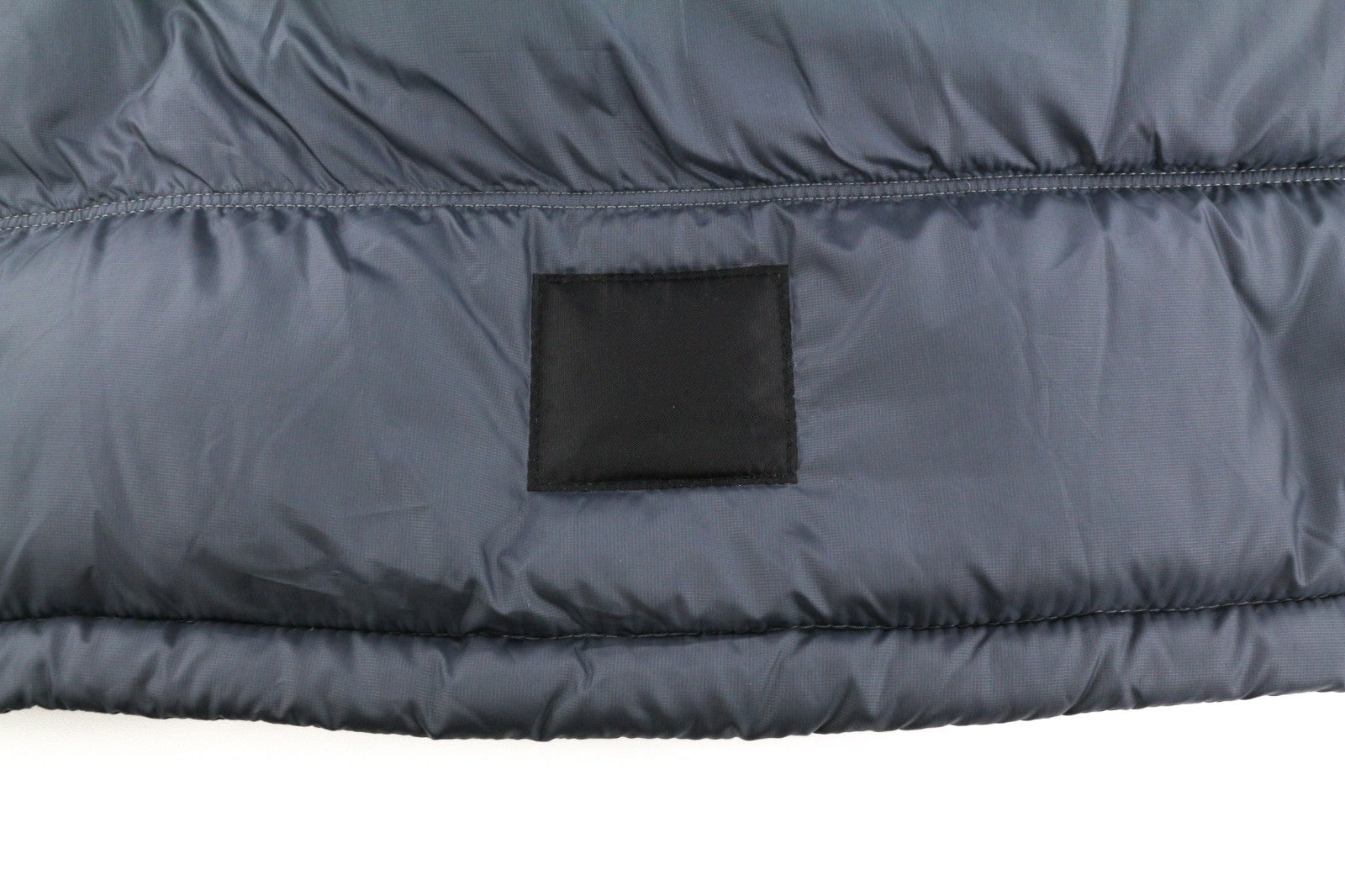 „THE NORTH FACE“ moteriška liemenė S 700 su dygsniuota pertekso izoliacija ir pūkine liemene 